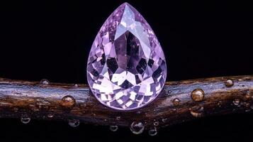 A sparkling purple gem on a wooden branch. photo