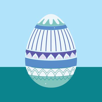Beautifully Decorated Easter Egg with Blue and White Geometric Patterns