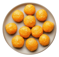 Plate with ladoo isolated on transparent background, top view png