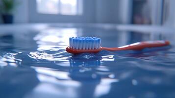 A toothbrush floating in water. photo