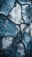 Cracked blue and gray textured surface. photo