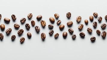 Coffee beans arranged on a light background. photo