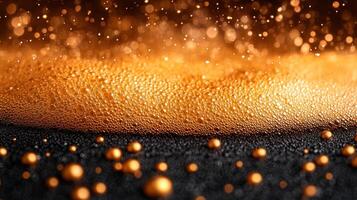 Close-up of orange foam with sparkling droplets. photo