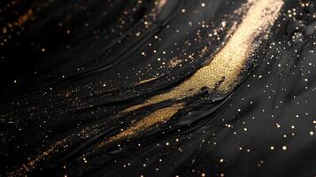 Abstract black and gold texture with glitter. photo