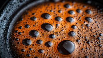 Close-up of water droplets on a textured surface. photo