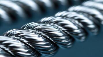 Close-up of twisted metallic wire for industrial use. photo