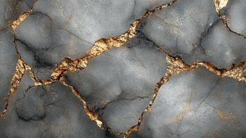 Cracked surface with golden highlights. photo