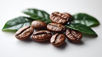 Coffee beans with leaves on a white background. photo