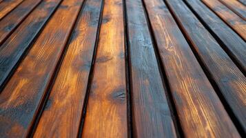Close-up of polished wooden planks in warm tones. photo