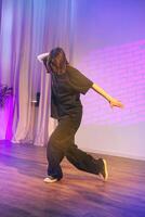 Dynamic dance performance in a vibrant studio setting during a creative workshop photo