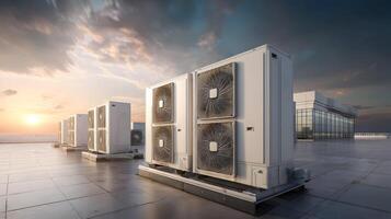 Row of air conditioning units on a rooftop against a dramatic sky at sunset or sunrise photo