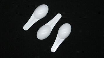 6 Syrup medicine spoon isolated photo