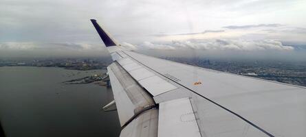 13. View of the island and sea from the airplane window photo