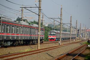 2. 19 December 2024, Indonesian Railways passing through the tracks of the city of Jakarta photo