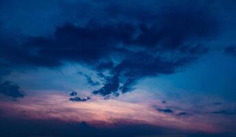 Stunning sunset sky with soft clouds photo