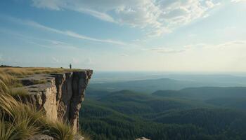 Majestic Cliff Overlooking Vast Landscape Under a Beautiful Sky During Golden Hour photo