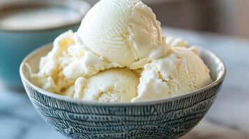 Creamy Vanilla Ice Cream Scoops in a Decorative Bowl. A close up image of delicious dessert. photo