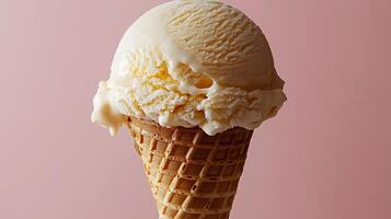 Close up of Melting Vanilla Ice Cream in a Waffle Cone on Pink Background. photo