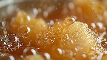 Close Up of Bubbles in Amber Liquid, Abstract Texture Background. photo