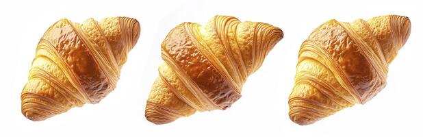 Three buttery croissants isolated on white background photo