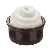 Sour cream swirl in small clay pot isolated on white background photo