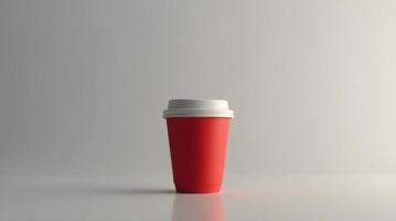 A red paper cup with a white lid, centered against a gradient gray background, offering a minimalist and clean aesthetic photo