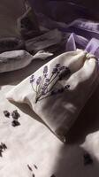 Serene lavender sachet embroidered floral design. calming, peaceful image photo