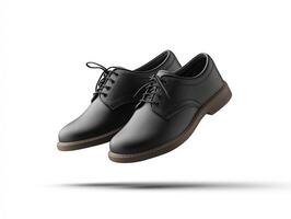 Stylish black school shoes floating in air, showcasing sleek design and modern appeal. Perfect for formal occasions or daily wear photo