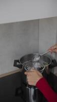 Exploring Various Cooking Techniques Utilizing Water and Utensils in the Kitchen Environment video