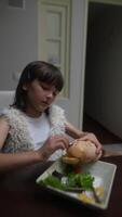 A Child Enjoying a Delicious Meal Made with Fresh Ingredients and Lots of Colorful Vegetables video