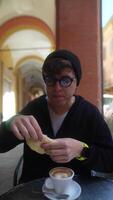 Savoring a Delightful Cup of Coffee and Fresh Bread in a Cozy and Charming Cafe Setting video