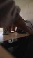 atractivo en moderno cocina comportamiento con un café fabricante y un taza para diario disfrute video