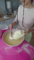 Mixing batter for creating delicious recipes in the kitchen is an enjoyable process video