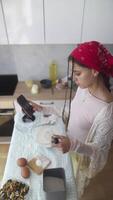 Baking and Cooking in a Modern Kitchen with the Help of Your Smartphone Devices and Apps video