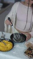 Whisking and combining various delicious ingredients creates magic in a cozy kitchen setting video