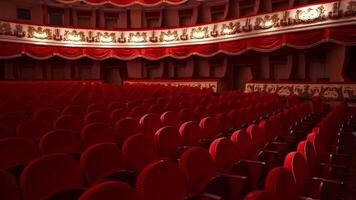 Empty red seats in theatre. Large hall without people. Vacant chairs or couches with no audience to watch a play. Closed place before the event. video