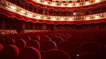Classical theater with no audience during lockdown. Empty seats in the opera house. Beautiful theatrical hall with rows of red chairs. Consequences of the pandemic. video