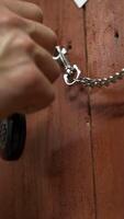 Take car keys from the table. Footage. Male hand takes car keys with remote control video