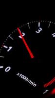 Close up of car speed meter. Footage. Interior of a modern car, dashboard with an engine speed dial and moving red arrow. video