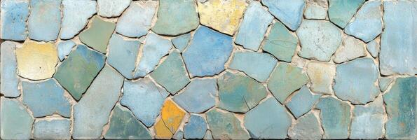 Mosaic wall with abstract blue and green pattern of irregular tiles photo