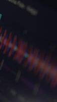 Closeup of professional concert equalizer analyzes the frequency range of music or any sound and can change it. Footage. Soft focus, blur around video