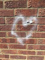 Graffiti heart on a brick wall photo