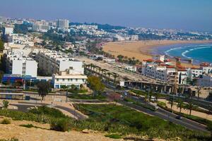 Agadir beach and cityscape, aerial view of agadir market and residential area photo