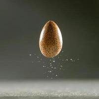Speckled Brown Egg Levitating Above a Surface with Floating Particles photo