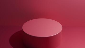 A red round object on a pink background photo