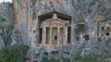 Ancient Lycian rock tomb carved into cliffs near Dalyan video