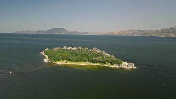 Diagonal flight over island on Lake Bafa in southwestern Turkey video