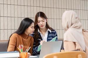 Focused Collaboration and Academic Support. Students gather to collaborate on assignments, enhancing their learning experience together. photo
