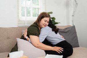 Emotional Support and Connection. A comforting hug shared between a psychiatrist and her client, fostering trust. photo