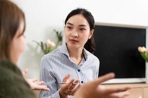 Therapeutic Conversation and Insight. A psychiatrist engaging in a meaningful dialogue with a client. photo